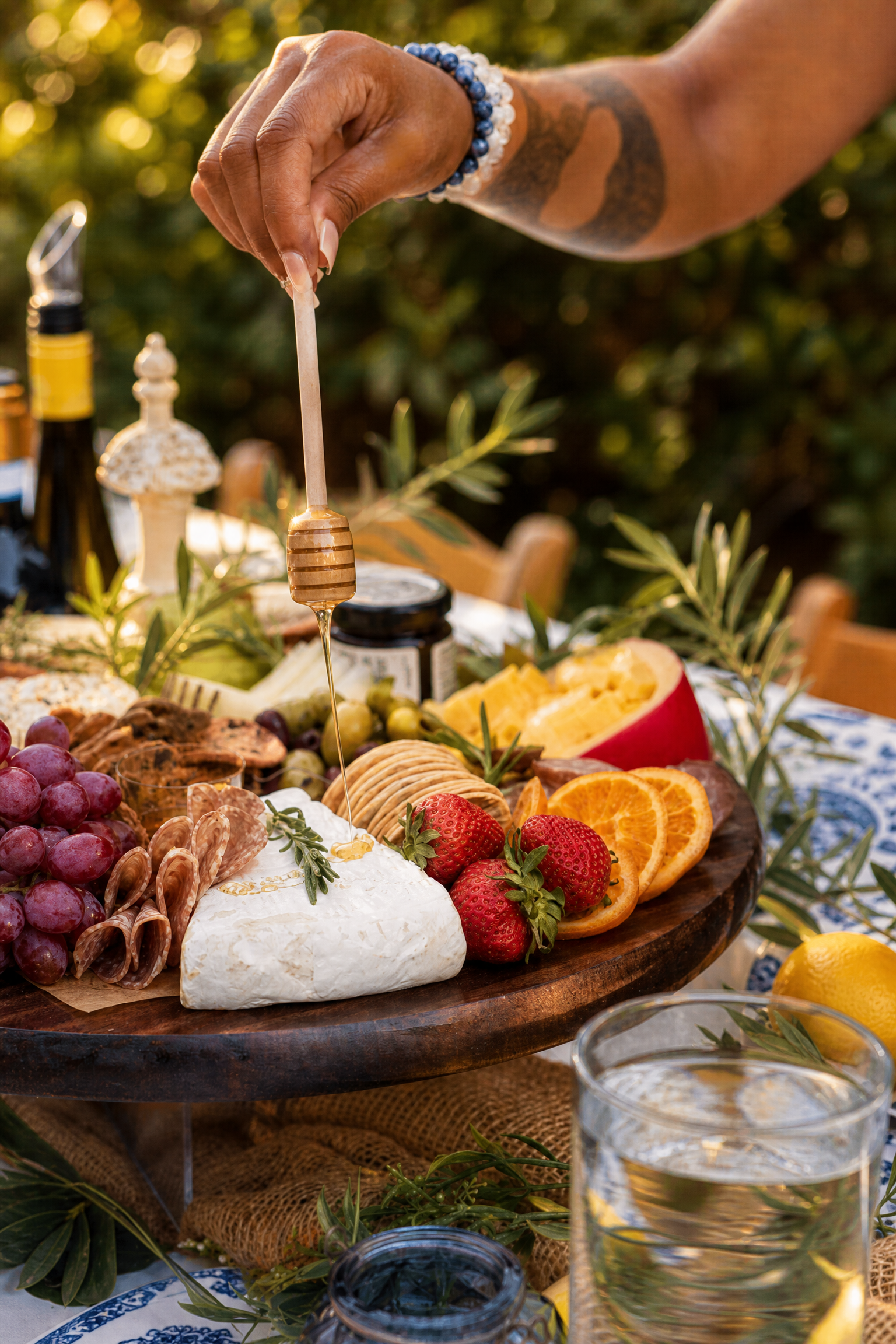 Event photo from Italian-Inspired Backyard Dinner Party by Poppin Social: 04 Italian Honey Charcuterie Moment.